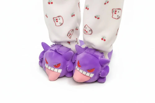Purple Pokémon Gengar cartoon character slippers worn with pajama pants featuring built in sock design for tongue